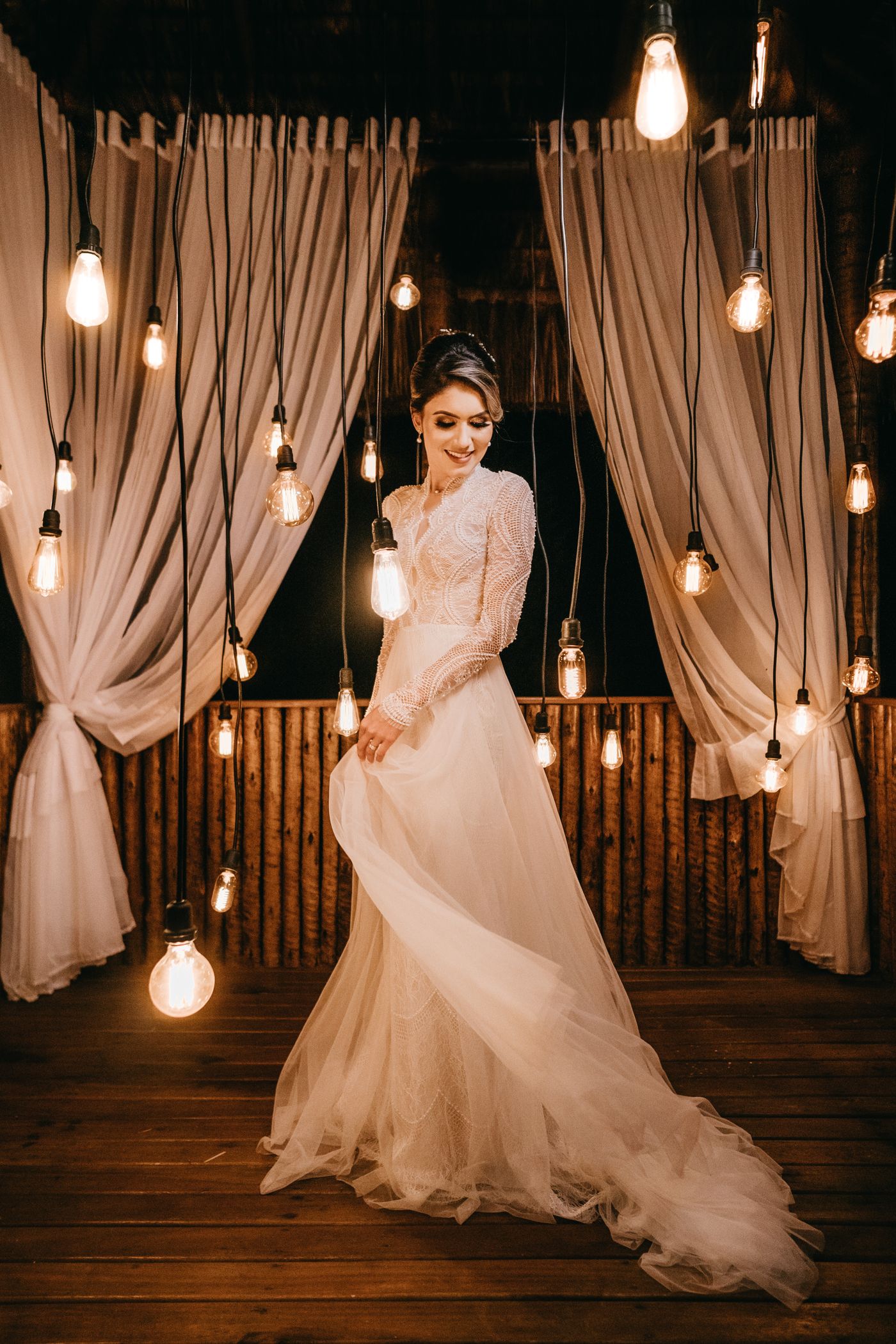 radiant bride in Edison-lit wedding venue — wedding photography London | ProShoot.io