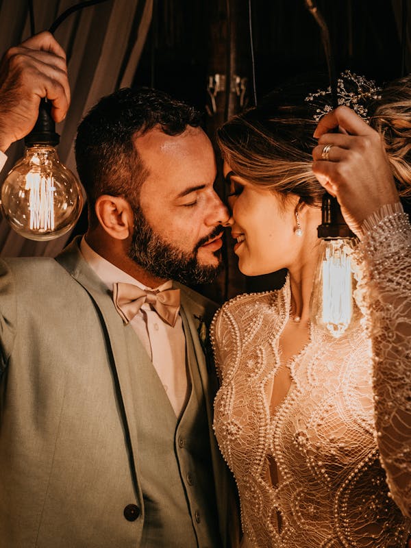 Intimate couple holding hands, showcasing emotional connection
