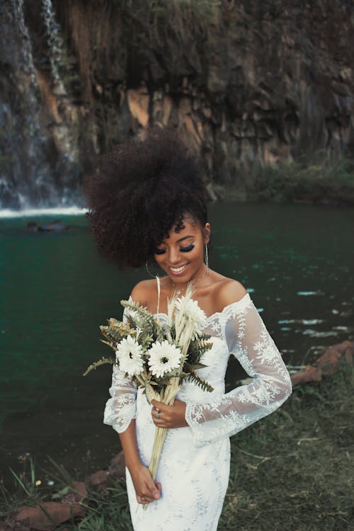 Standing Woman Wearing White Long-sleeved Dress