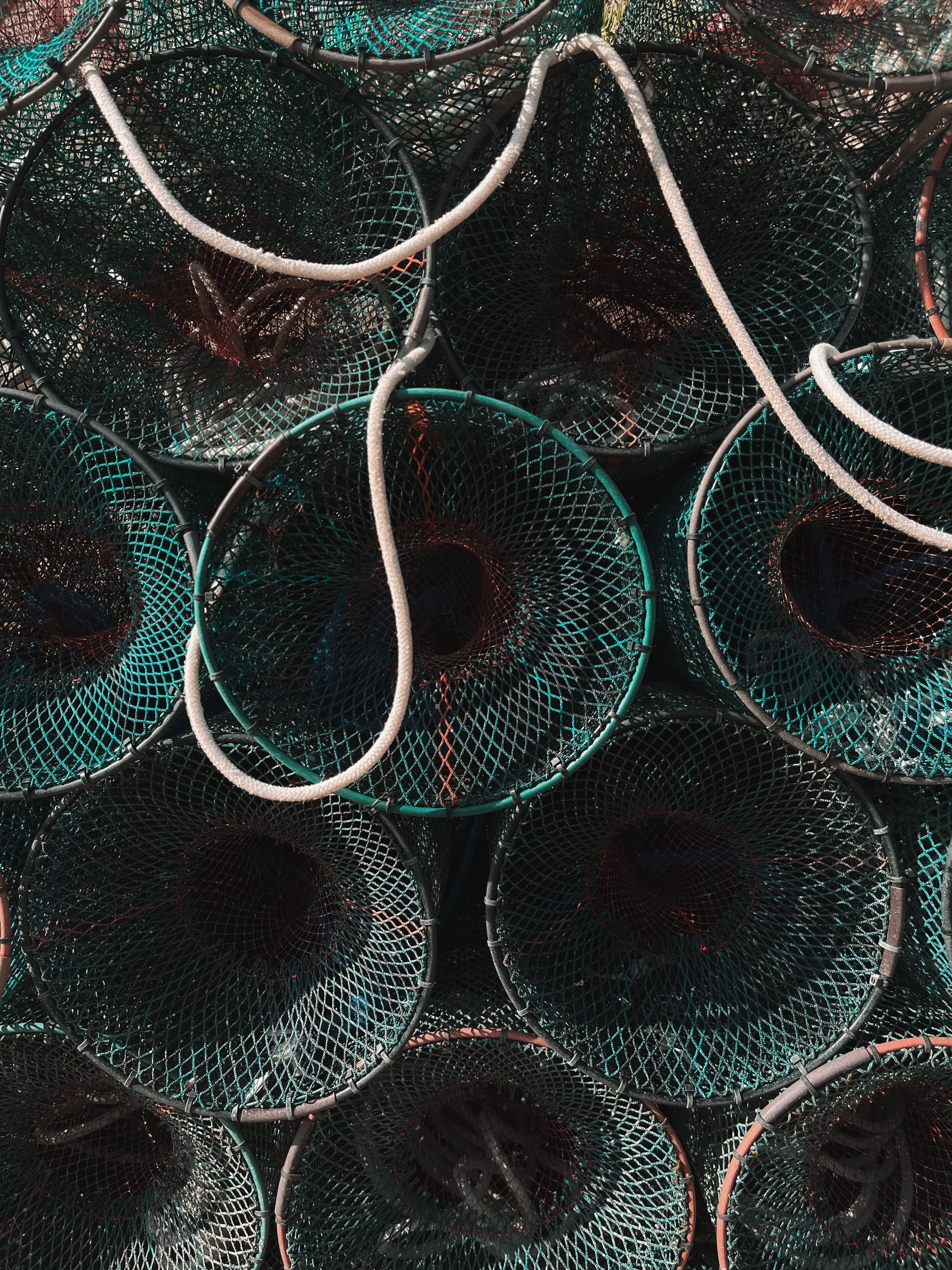 Stack of Fishing Nets with Rustic Ropes · Free Stock Photo