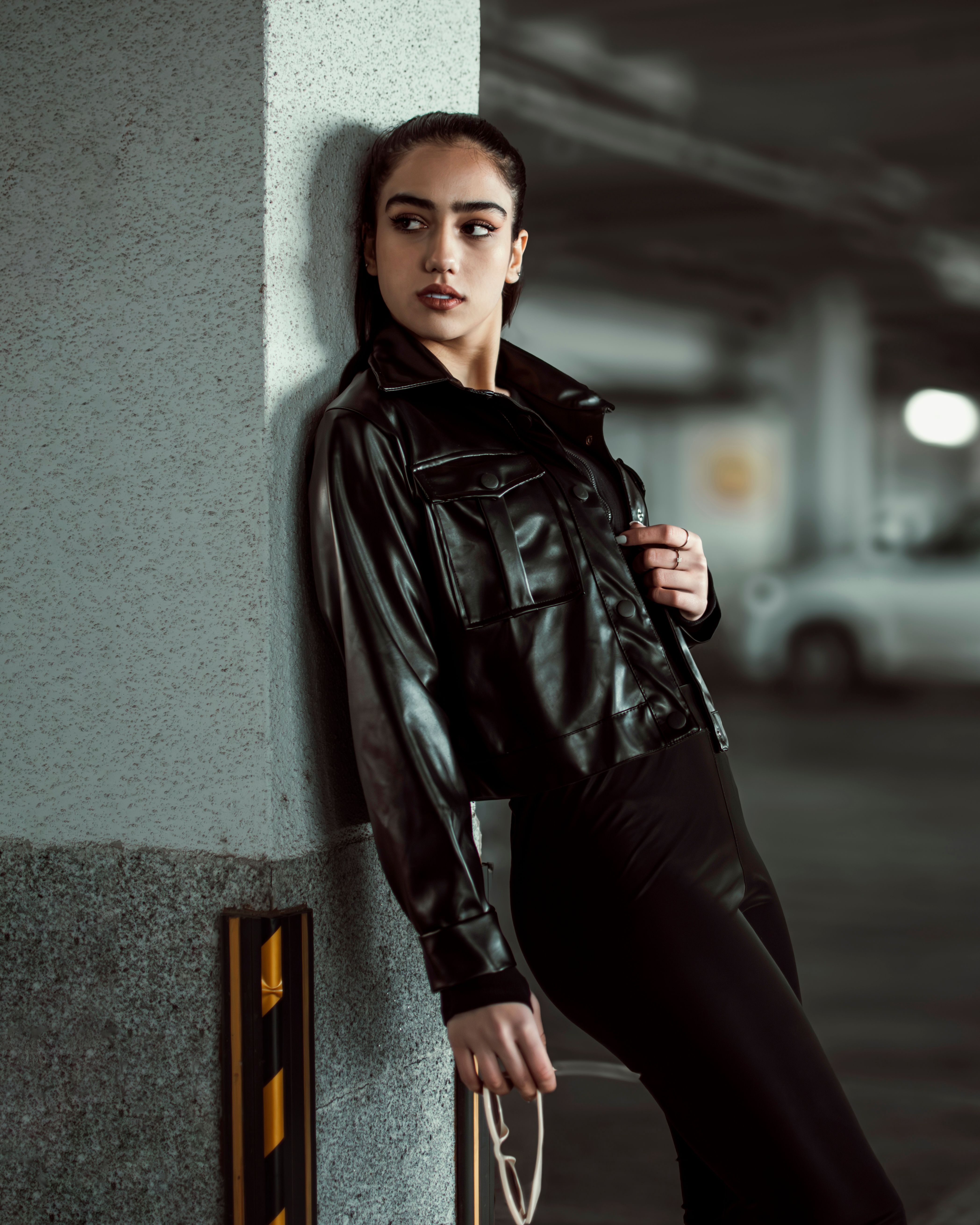 Stylish Young Woman in Urban Setting Portrait · Free Stock Photo