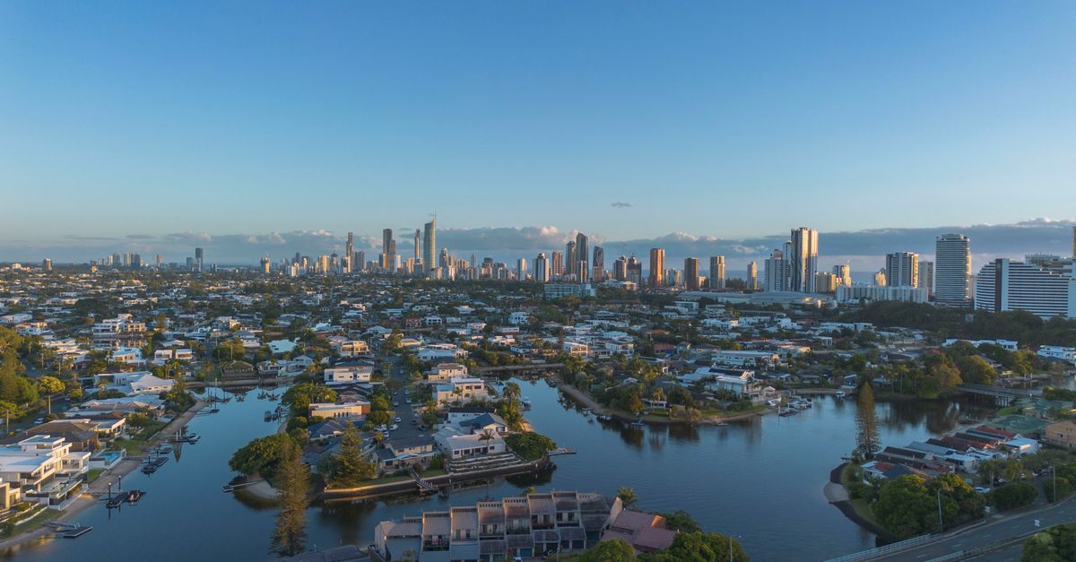 Stunning 4K aerial shot of the Gold Coast skyline in Queensland, Australia at sunset.