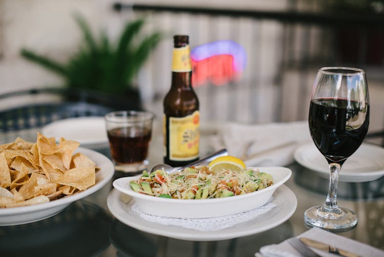 Salad And Half-filled Wine Glass