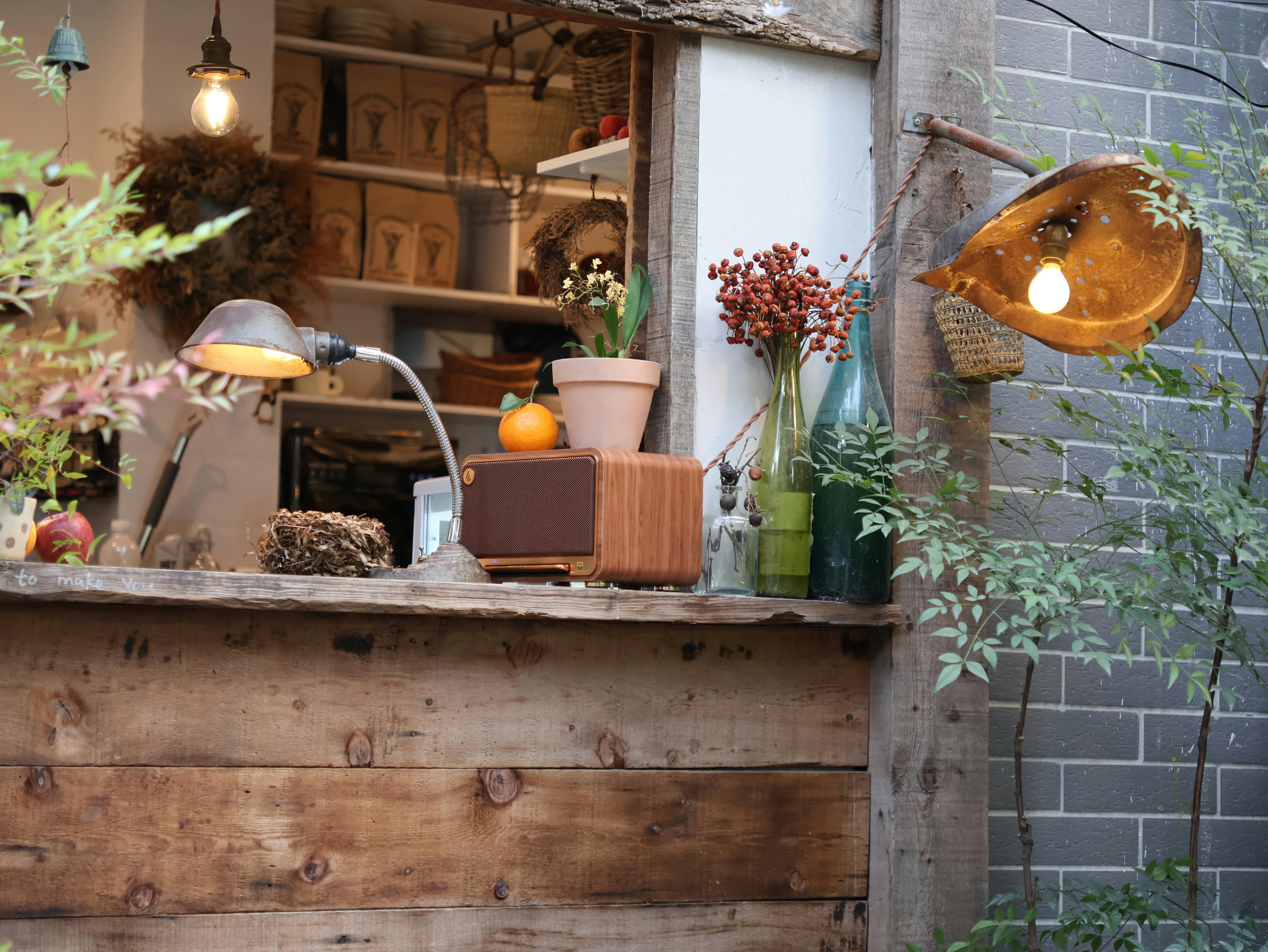 Rustic cafe window with vintage lamps and warm decor, perfect for an inviting ambiance