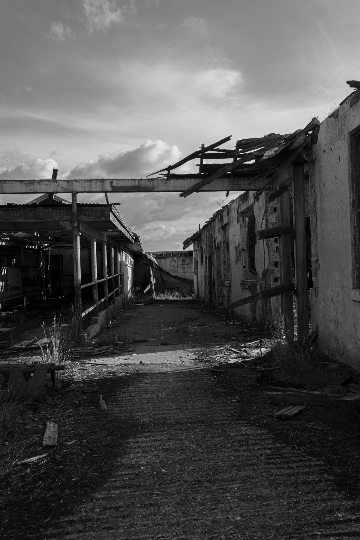 Decaying abandoned concrete industrial structure resembling the ruins of Gunkanjima Battleship Island near Nagasaki