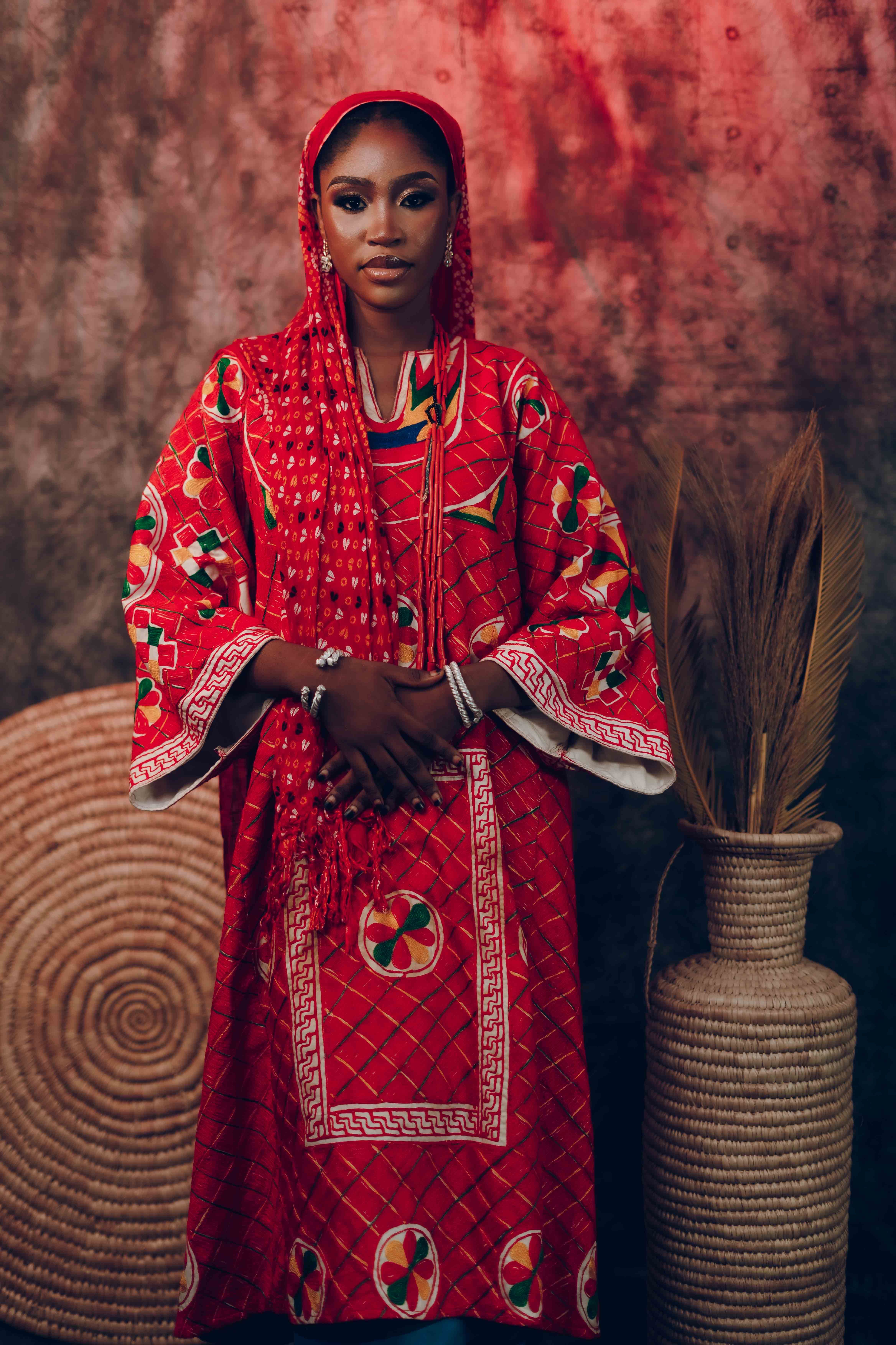 Portrait of Woman in Traditional Red Attire · Free Stock Photo