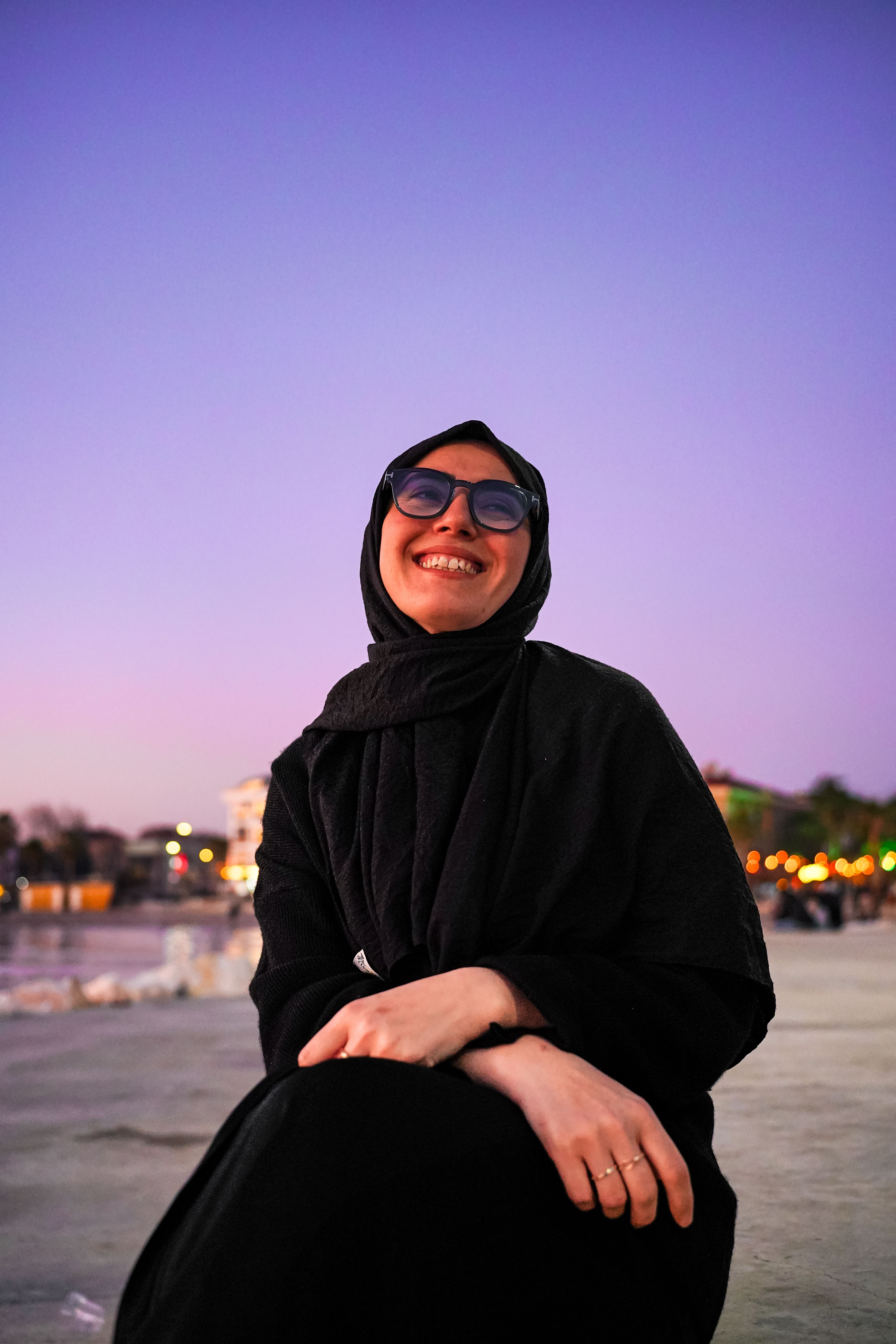 Smiling Woman in Hijab by Sunset Beach · Free Stock Photo