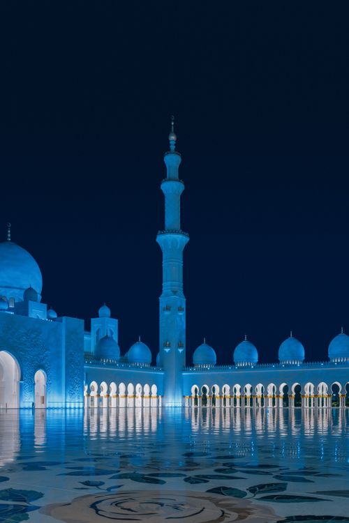 Free Beautiful blue-lit Sheikh Zayed Mosque at night, showcasing Islamic architecture and spirituality. Stock Photo