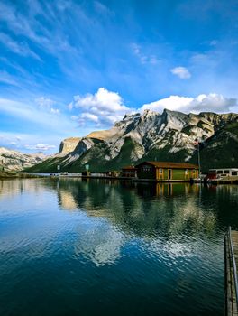 Idyllic mountain and lake scenery at Banff National Park, featuring tranquil waters and majestic peaks.