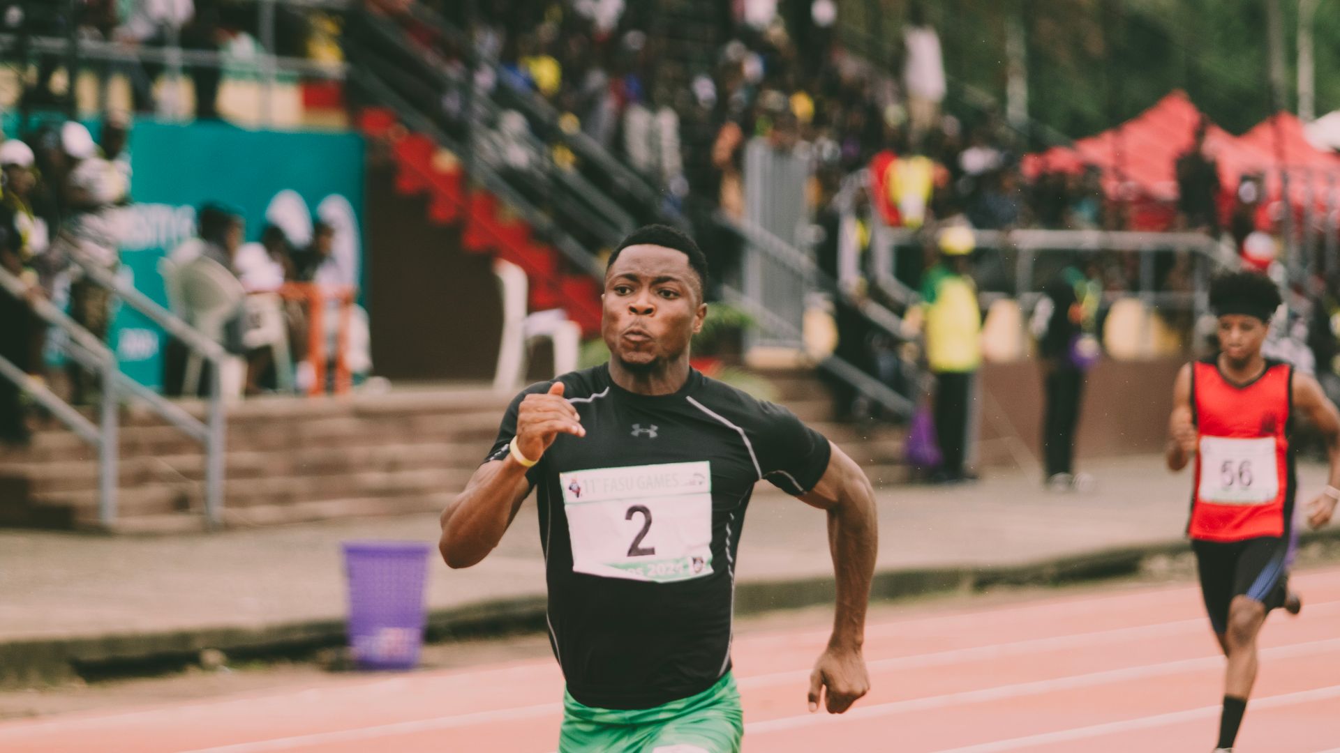 Modafinil for Athletes: Boosting Performance, Unlocking Potential Athlete in green shorts sprinting on track, racing towards victory — modafinil for athletes