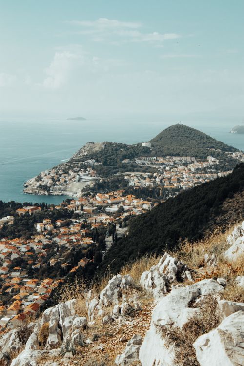 Free A breathtaking aerial view of Dubrovnik's historic coastal cityscape along the Adriatic Sea. Stock Photo