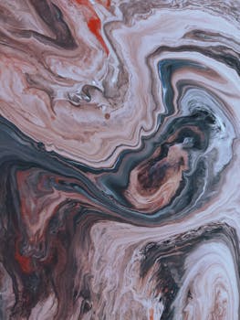 这件抽象艺术作品令人惊叹，它融合了大理石纹理与鲜艳色彩，非常适合现代装饰，并能激发创意灵感