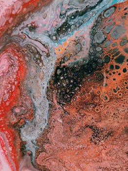 这幅抽象流体艺术作品充满活力，色彩丰富，漩涡图案生动鲜明