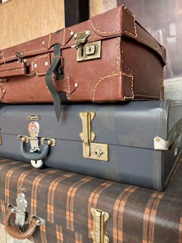 Stack of vintage suitcases showcasing classic design in Dubai, UAE.