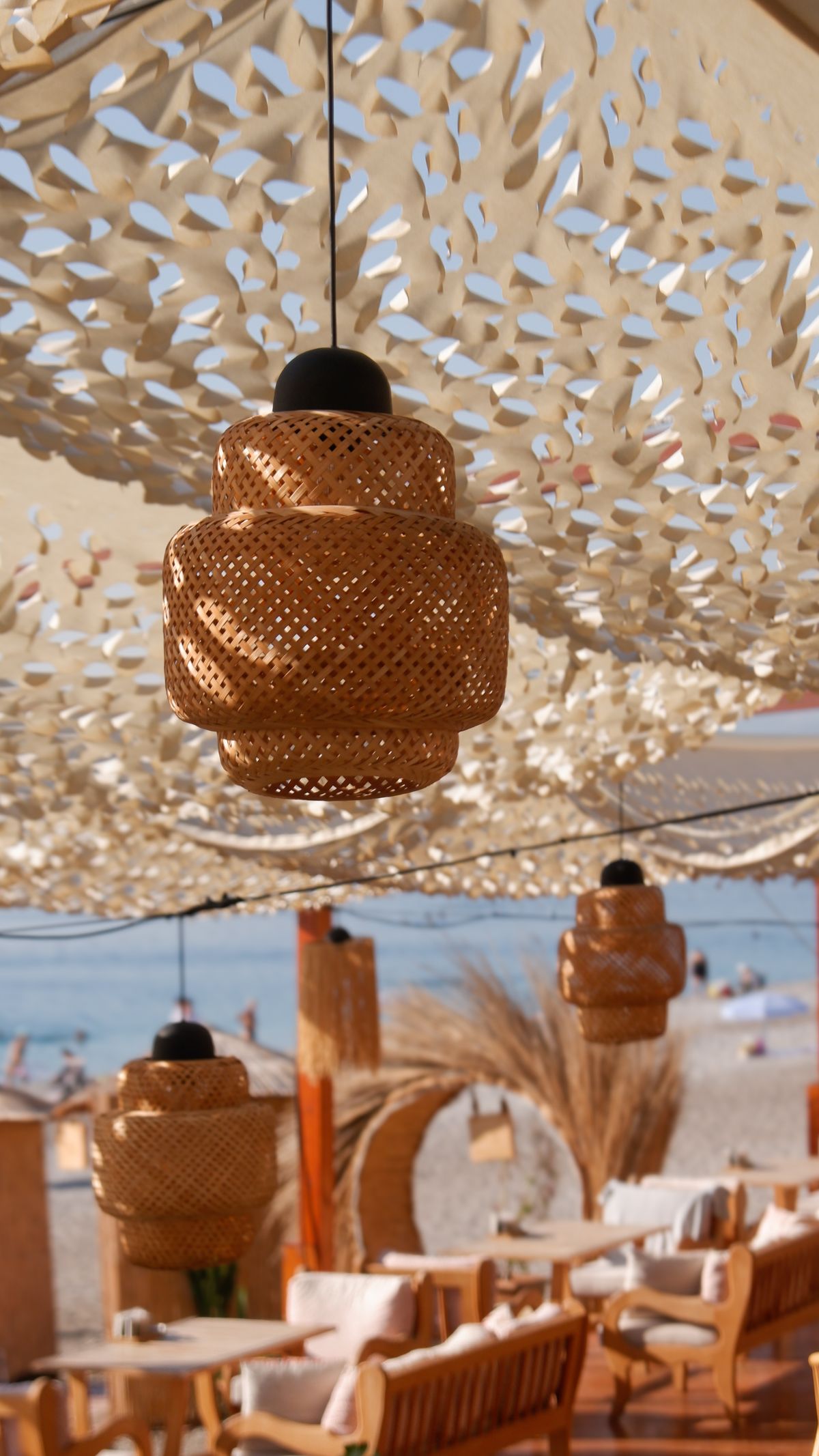 A relaxing outdoor beachfront café decor in Ibiza — the sunset cocktail ritual