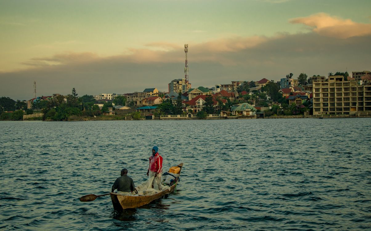Fishermen On Lake Kivu Near Goma At Sunset Free Stock Photo fishermen-on-lake-kivu-near-goma-at-sunset-free-stock-photo