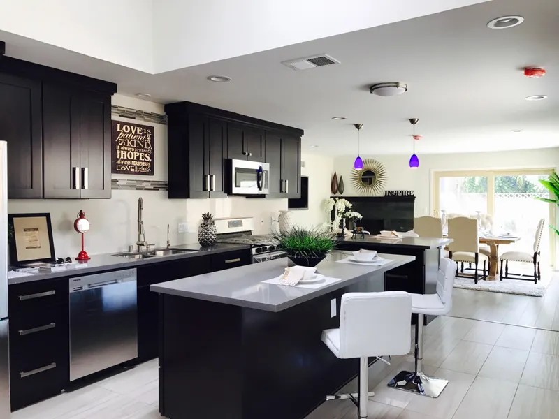 Home kitchen with a refrigerator and cabinets Home kitchen with a refrigerator and cabinets