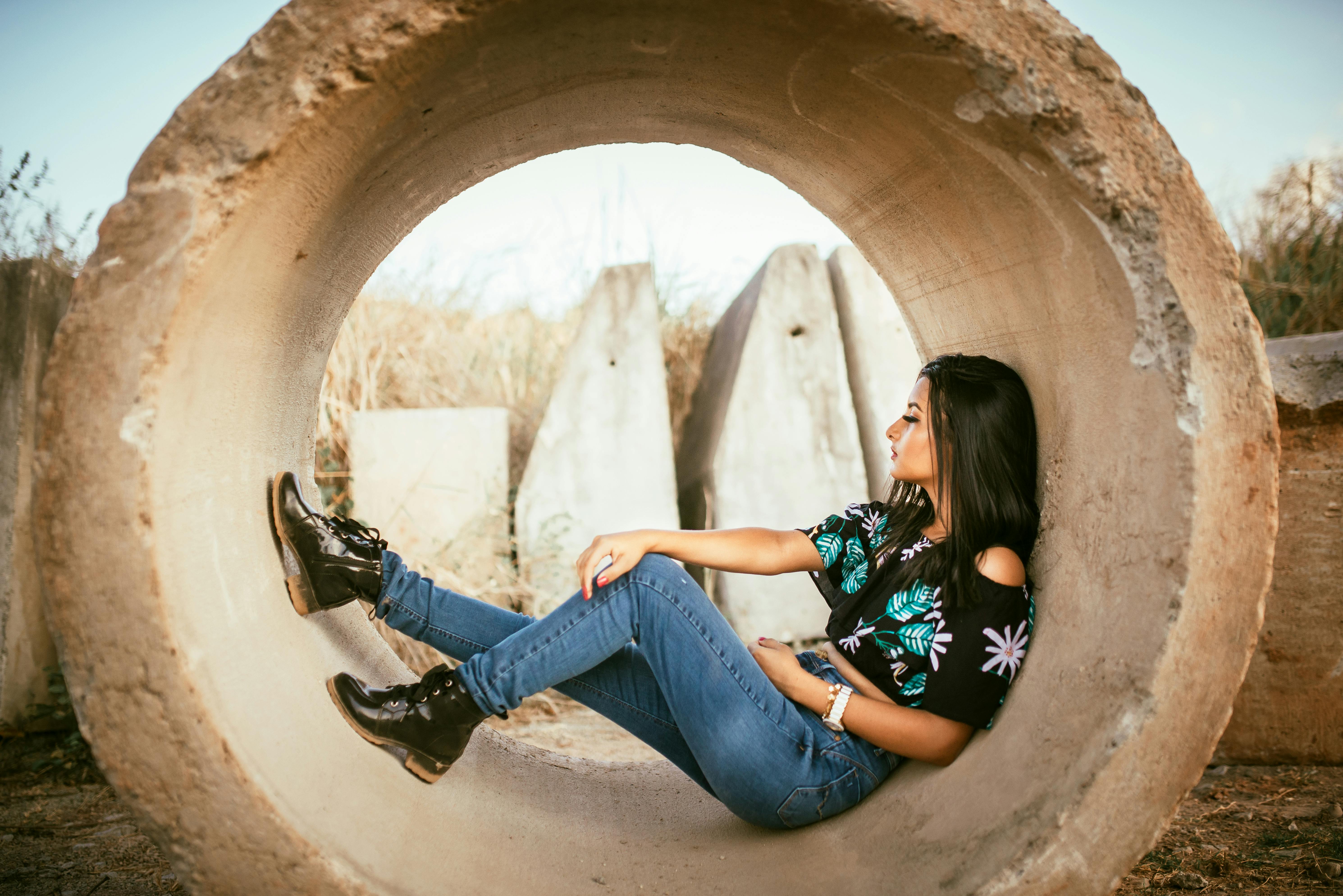 person inside concrete tube