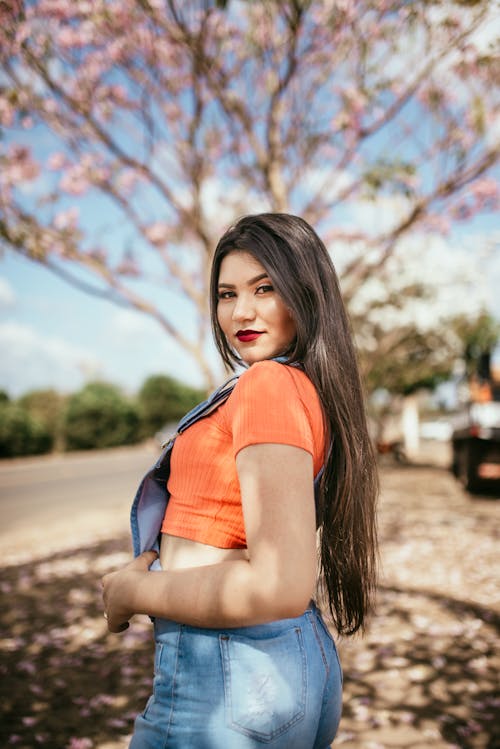 Photo Of Woman Wearing Orange Top