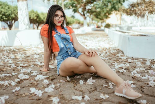 Photo Of Woman Sitting On Ground