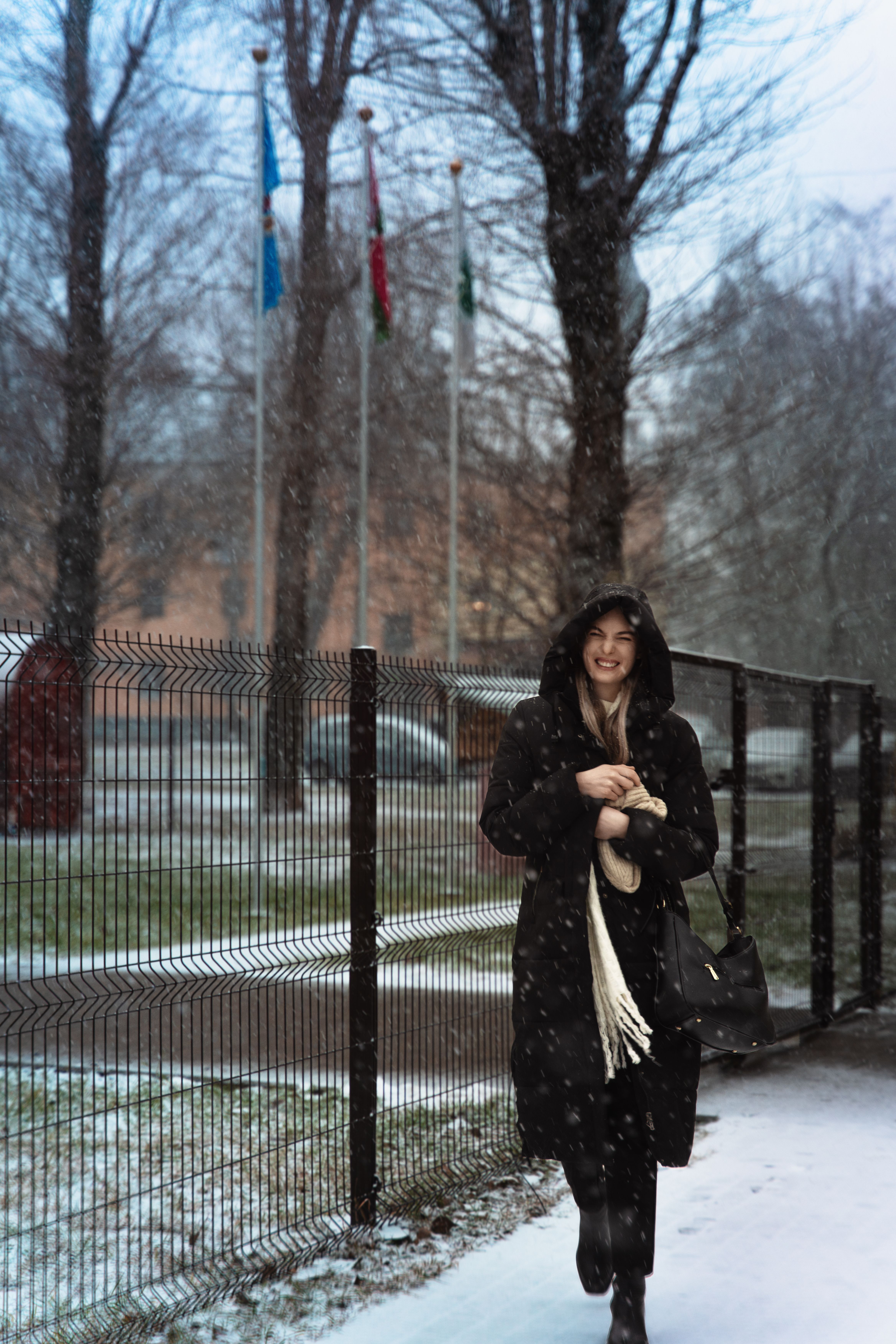 Woman Walking in Snowy Minsk Park · Free Stock Photo