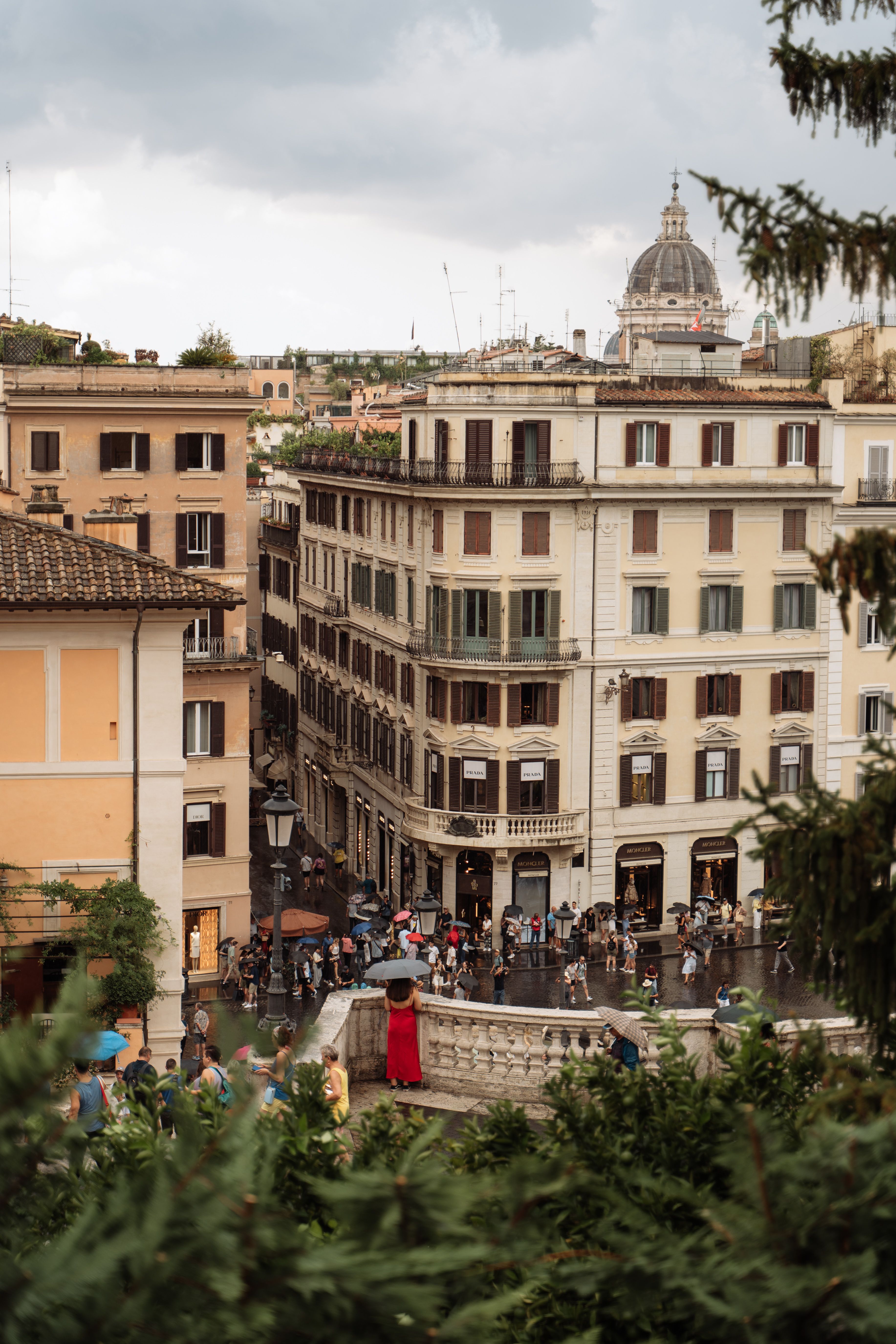 Bustling Piazza in Rome During a Summer Rain · Free Stock Photo