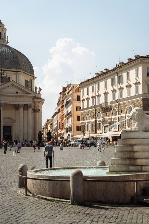 Free Explore the historic Piazza del Popolo in Rome, showcasing classic architecture and lively city life. Stock Photo