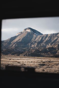 Captivating landscape view of Flat Top Mountain, Colorado with clear skies and rugged terrain.