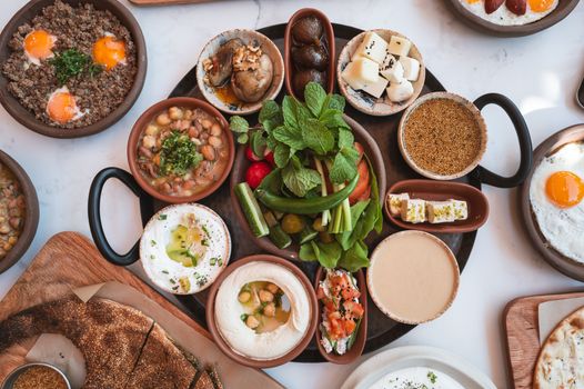 Lebanese cuisine with various dishes and fresh ingredients in Dubai.