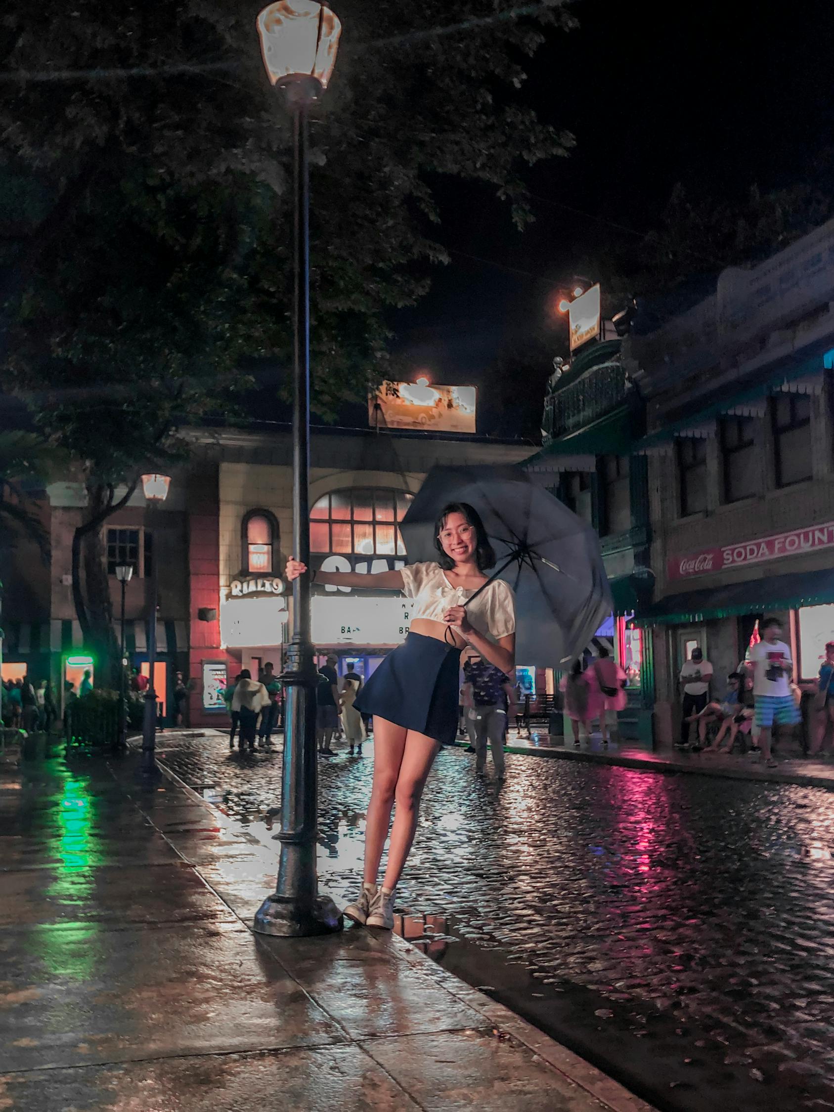 Woman Under Black Umbrella · Free Stock Photo