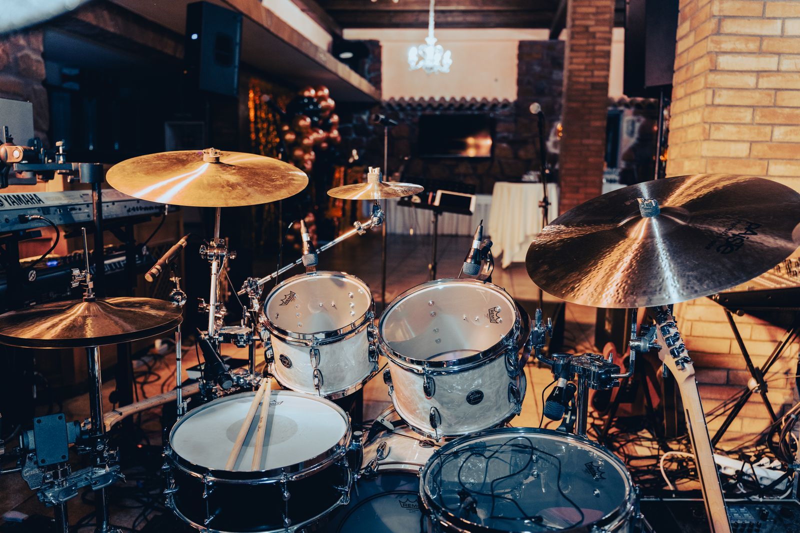 Drum kit set up in a cozy indoor music studio