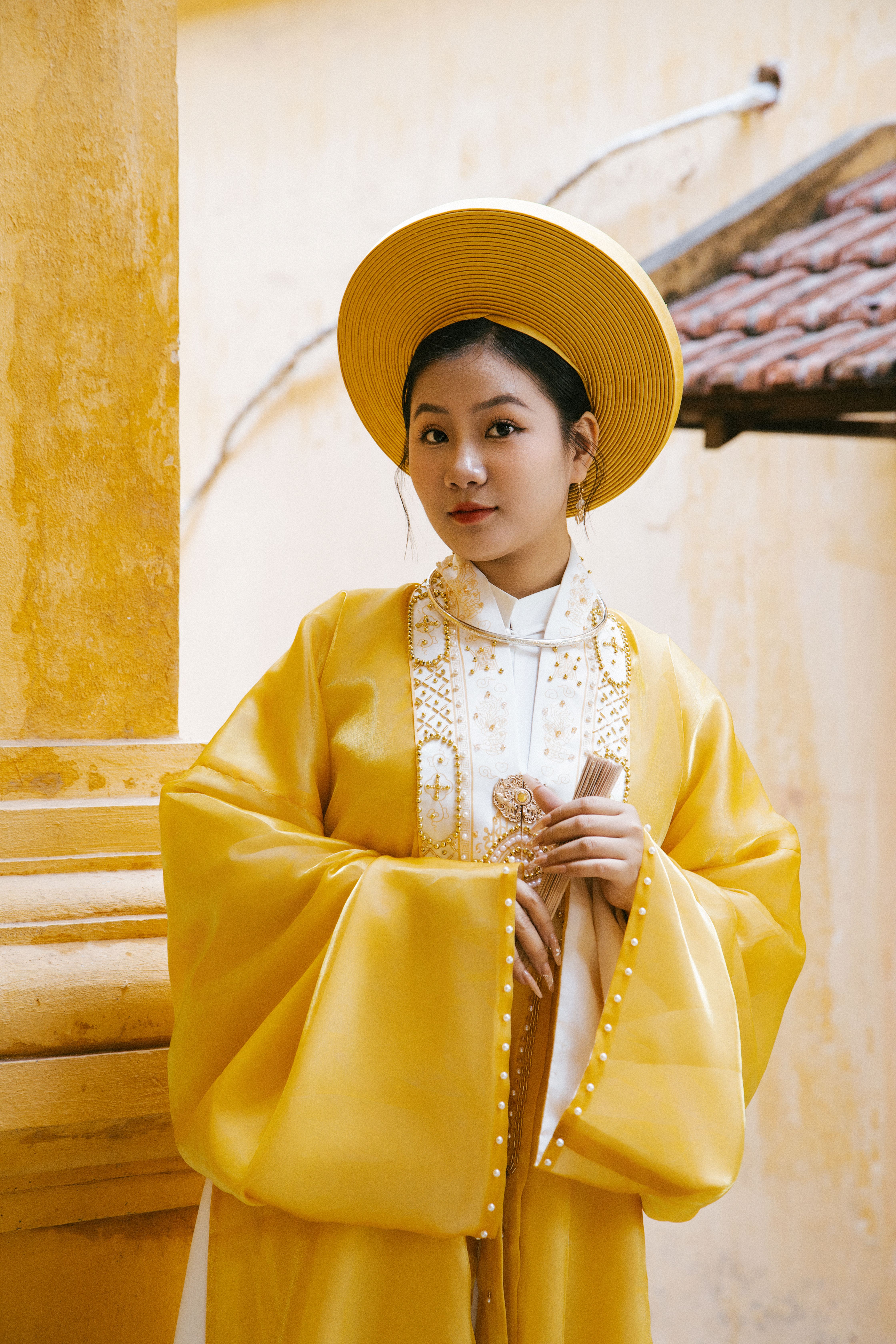 Zadarmo Portrét ženy v tradičnom vietnamskom oblečení v Hà Nội vo Vietname. Fotka z fotobanky