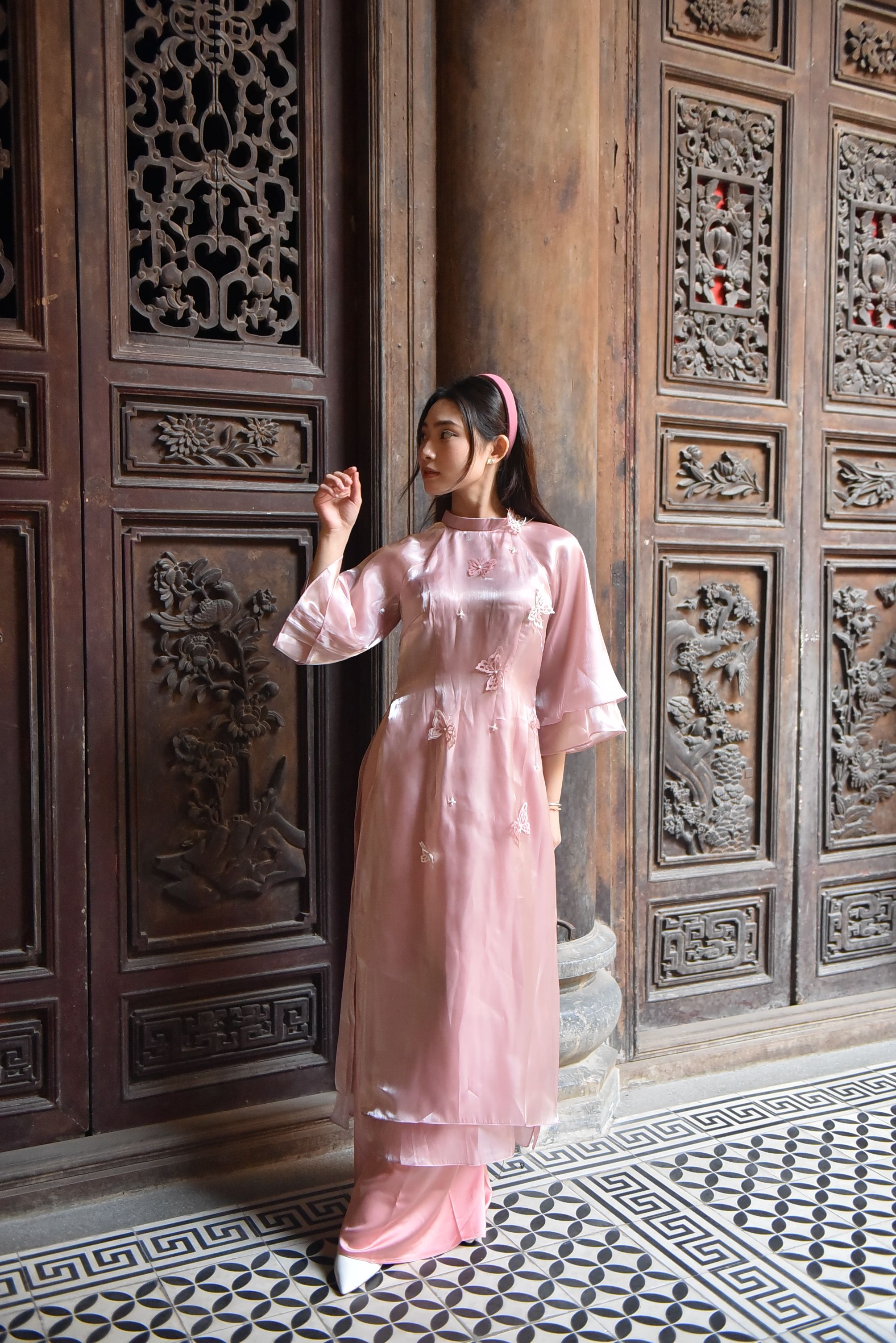 Young Woman in Traditional Pink Dress Indoors · Free Stock Photo