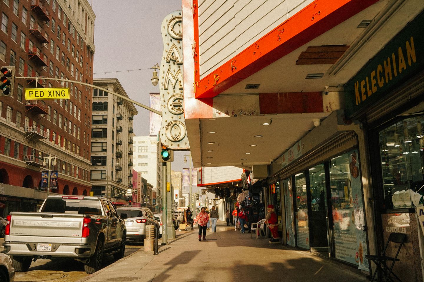 Vibrant Koreatown Los Angeles street with neon signage, historic buildings, and pedestrians