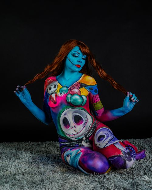 Free Artistic surreal makeup with fantasy elements captured in vibrant colors. Stock Photo