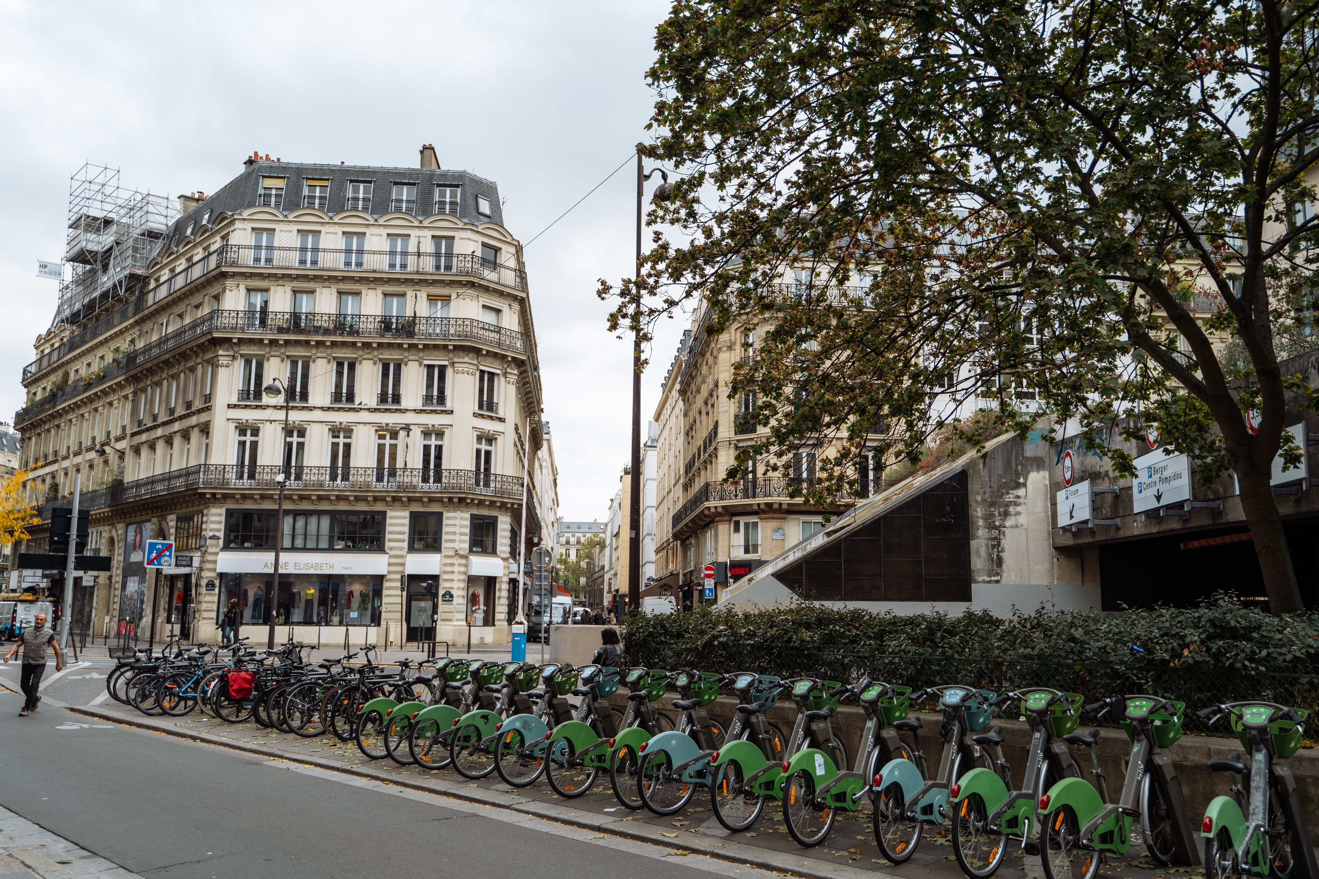 A row of Velib' M	ropole bikes parked at a station in Paris