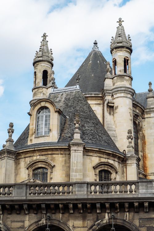 Free Explore the classic Gothic architecture of a historic church in Paris. Stock Photo