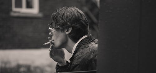 Free stock photo of 35mm film, black and white portrait, cigarette