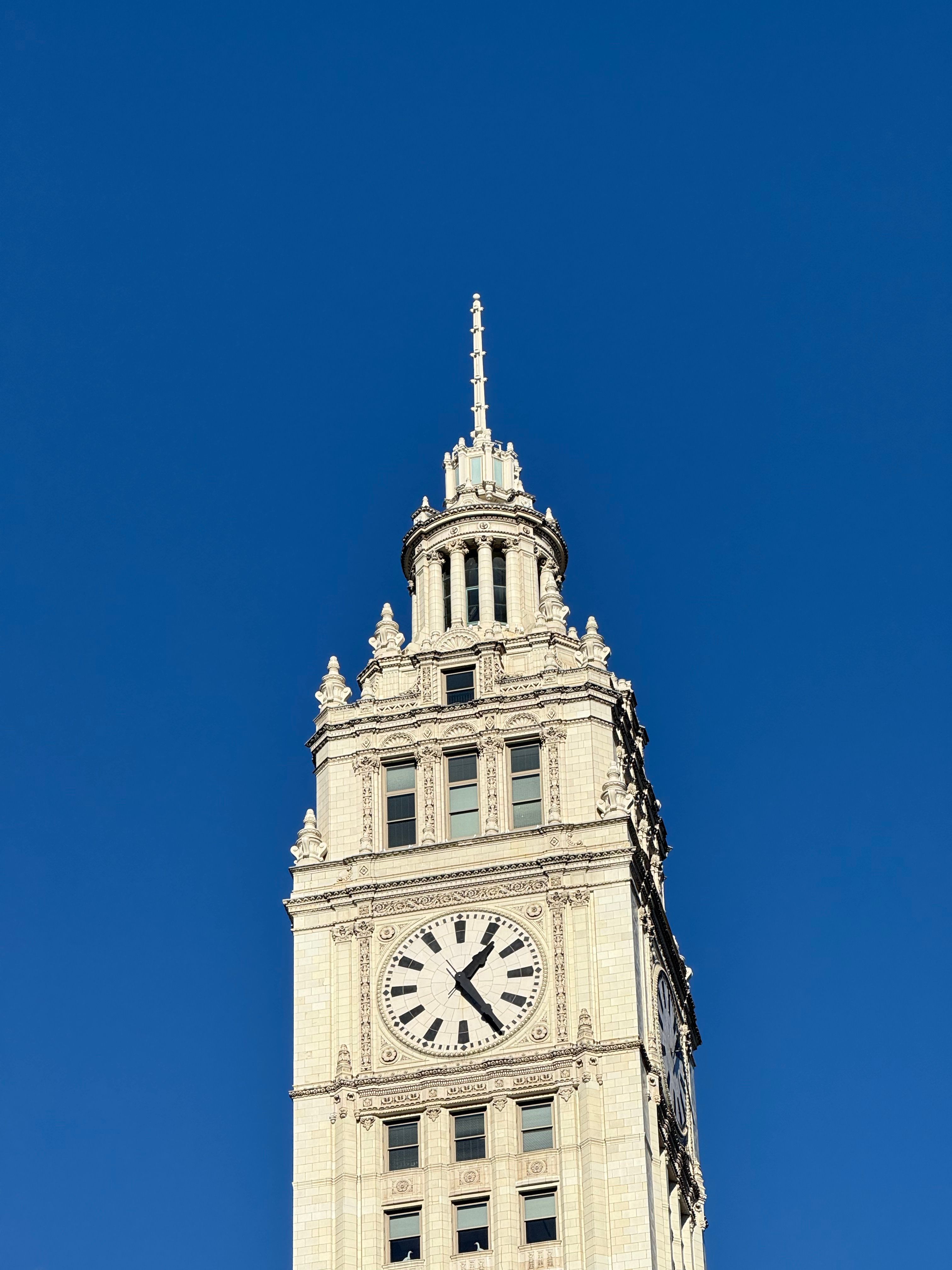 Historic Clock Tower Against Clear Blue Sky · Free Stock Photo