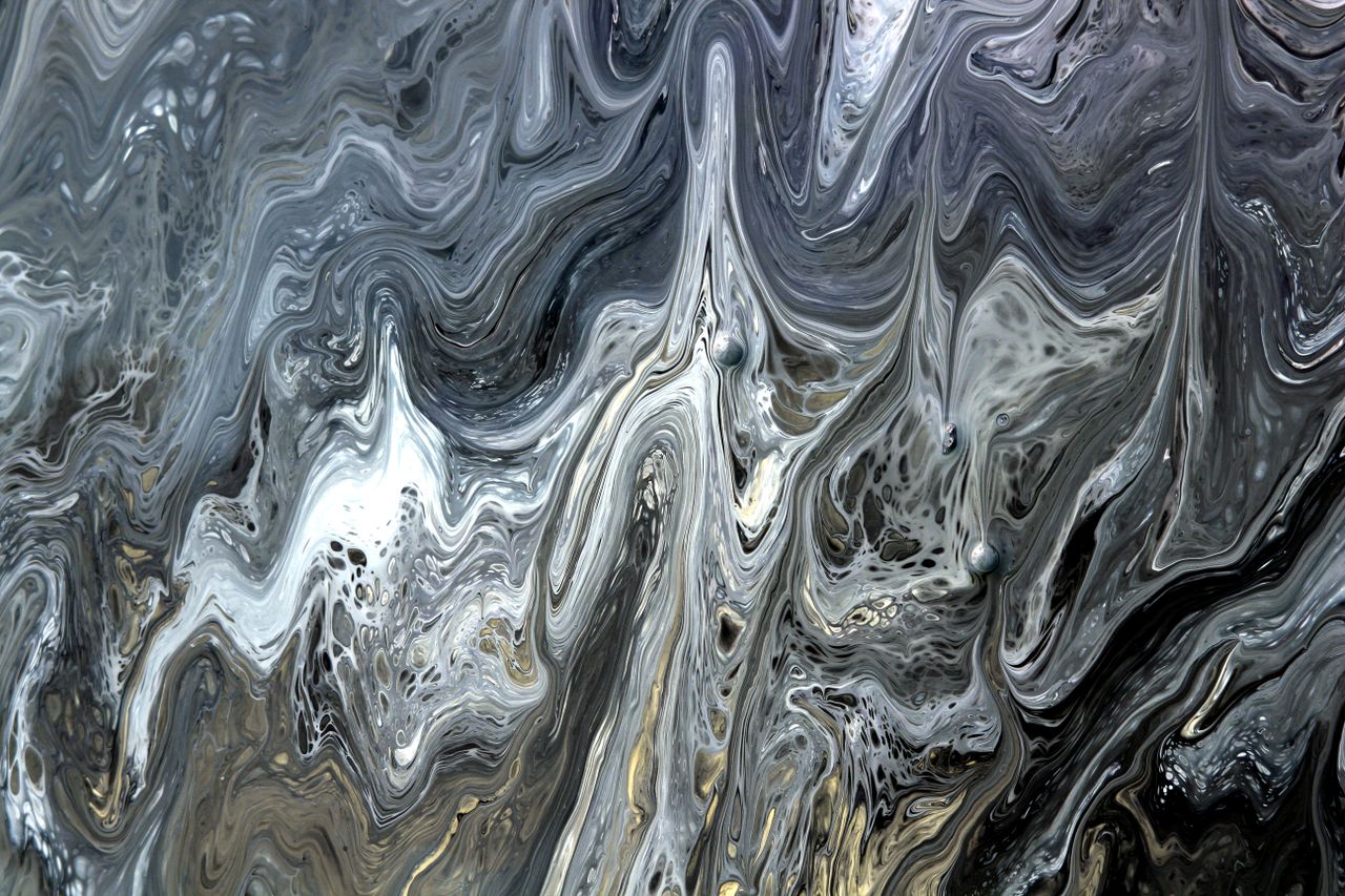mesmerizing abstract fluid art with swirling gray patterns creating a