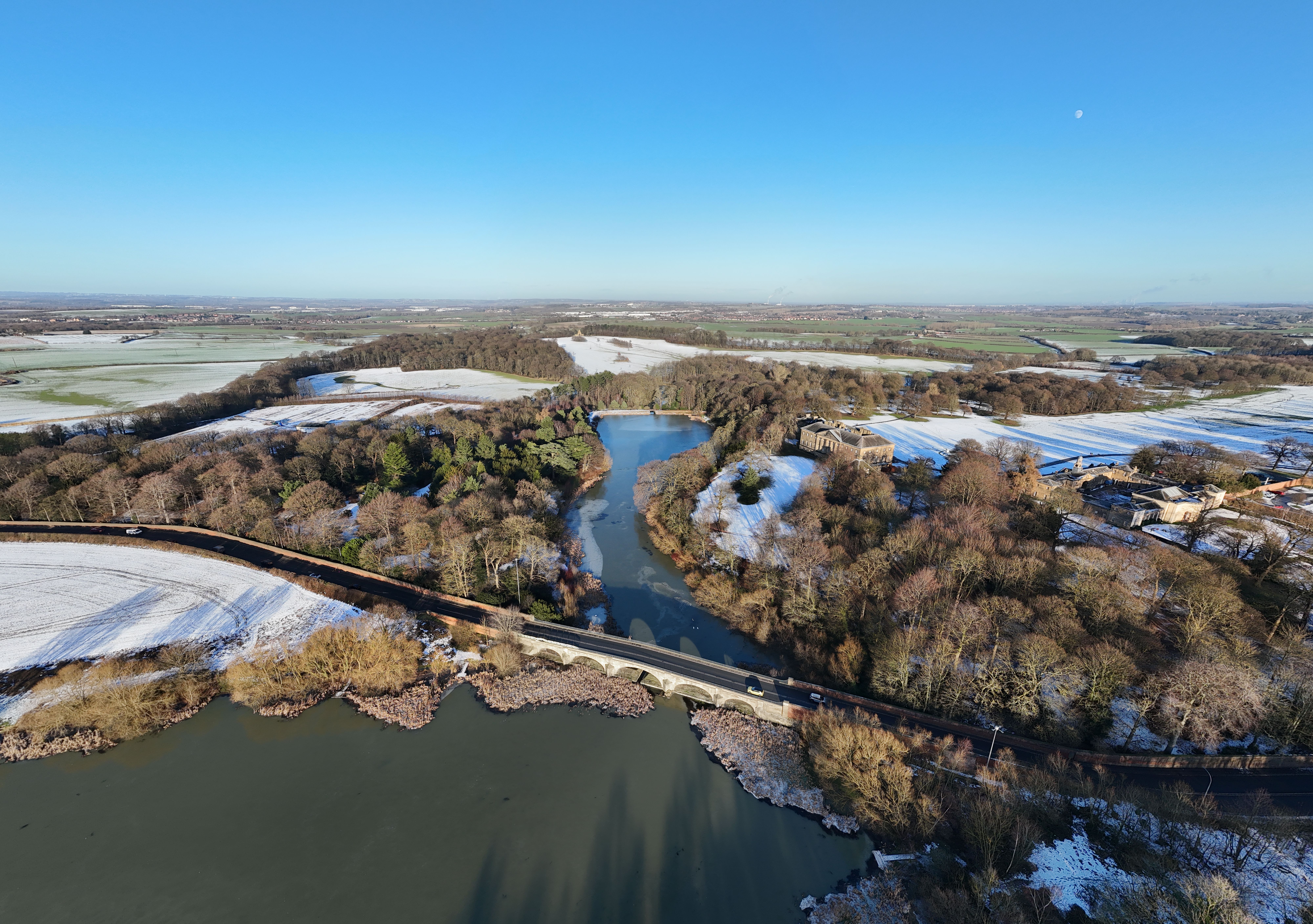 Aerial Winter Landscape of River and Snowy Fields · Free Stock Photo