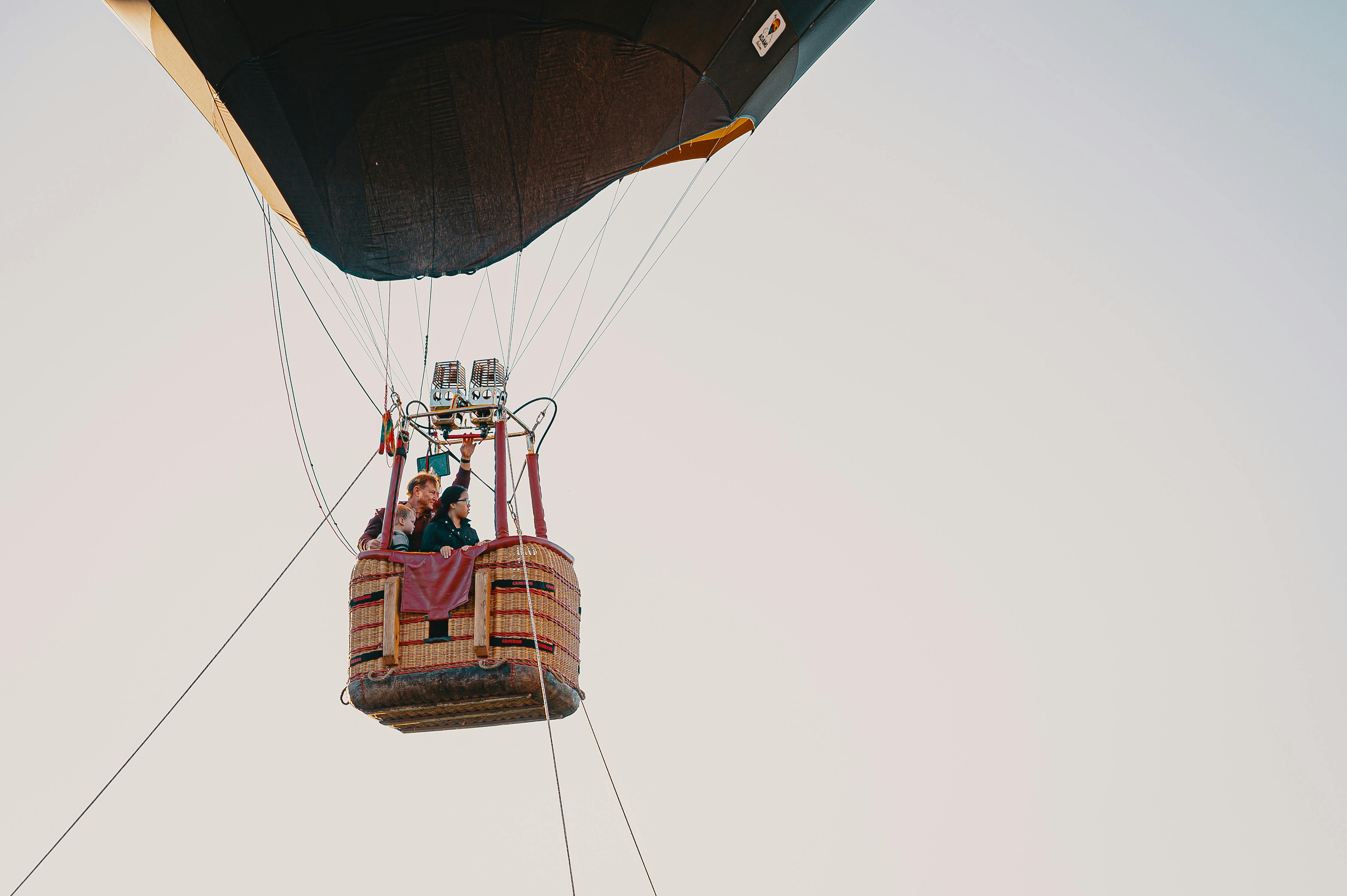 people in a hot hair balloon