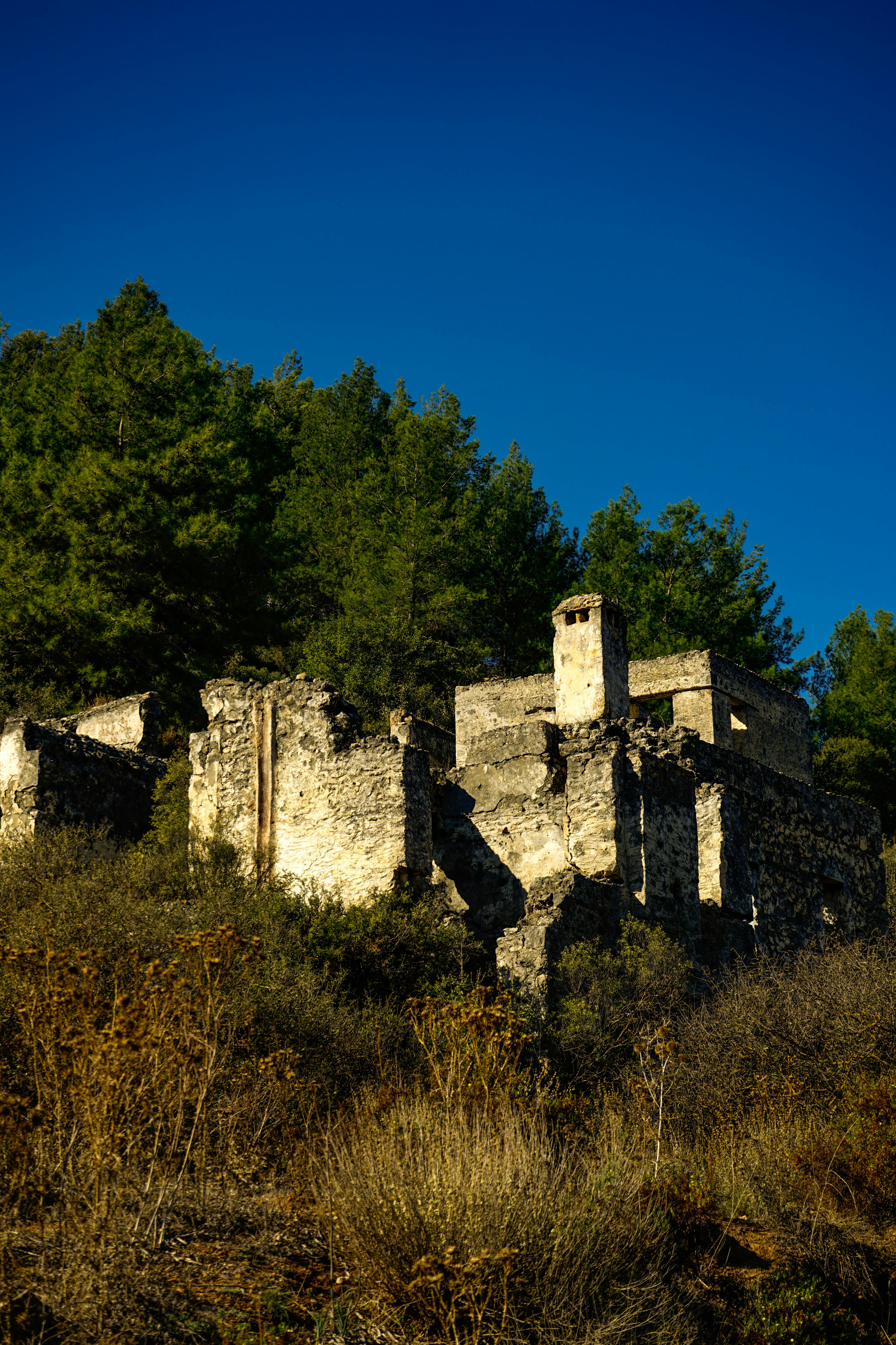 ancient ruins in kayakoy turkiye under clear blue sky