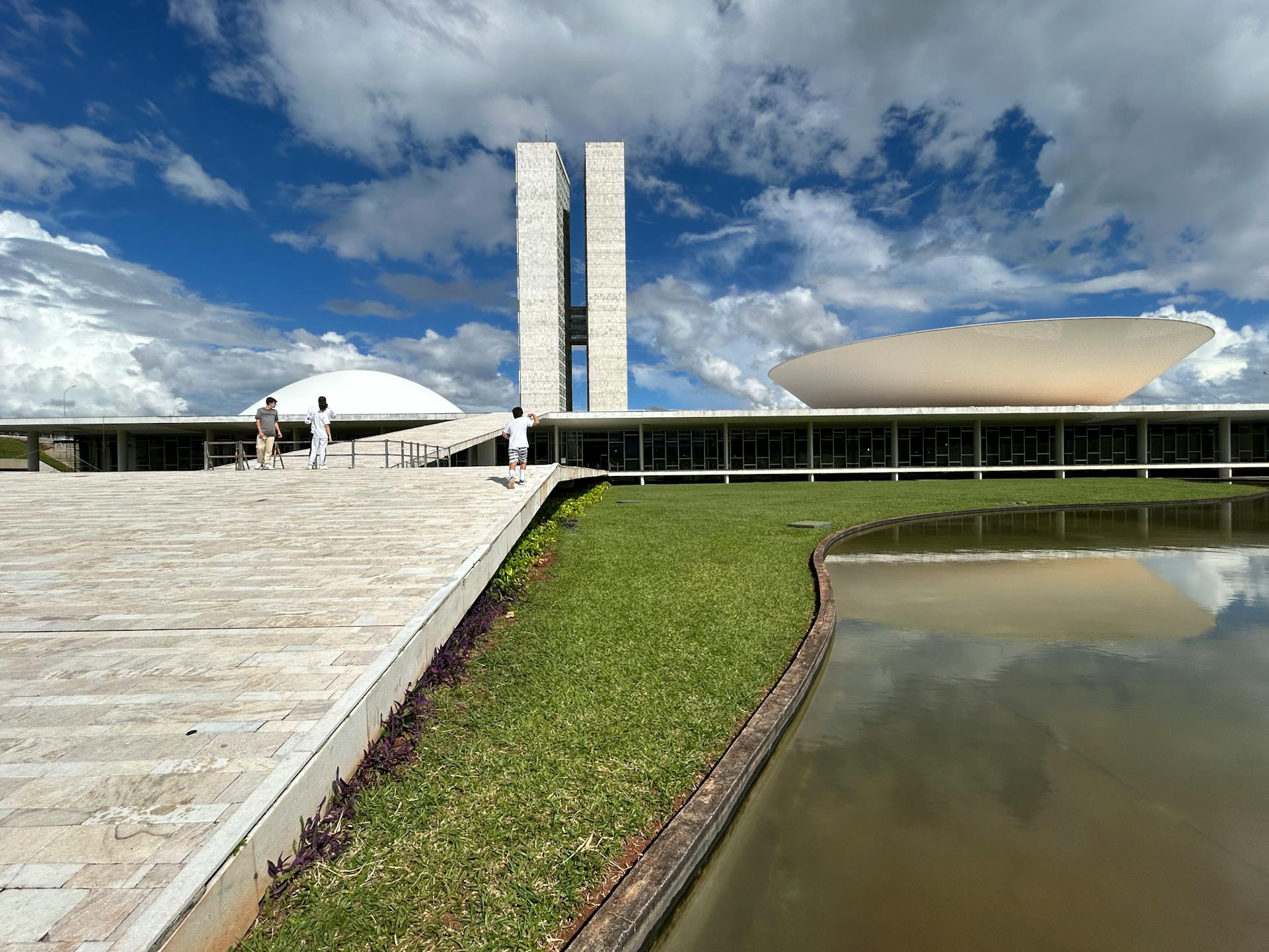 Stunning view of the National Congress of Brazil with its iconic modern architecture under a bright sky.