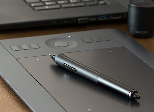無料 灰色の電子ブックリーダーのペン 写真素材