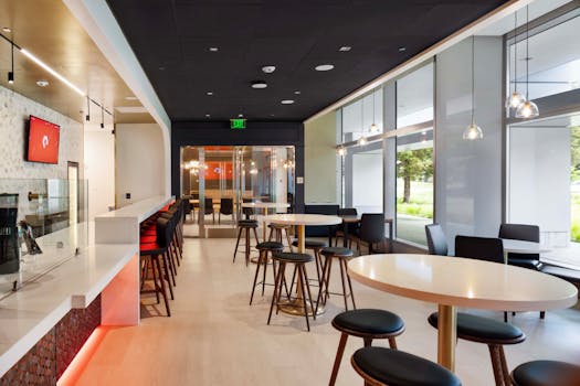 Contemporary cafe interior featuring sleek design, well-lit space, and stylish furniture in Dubai.