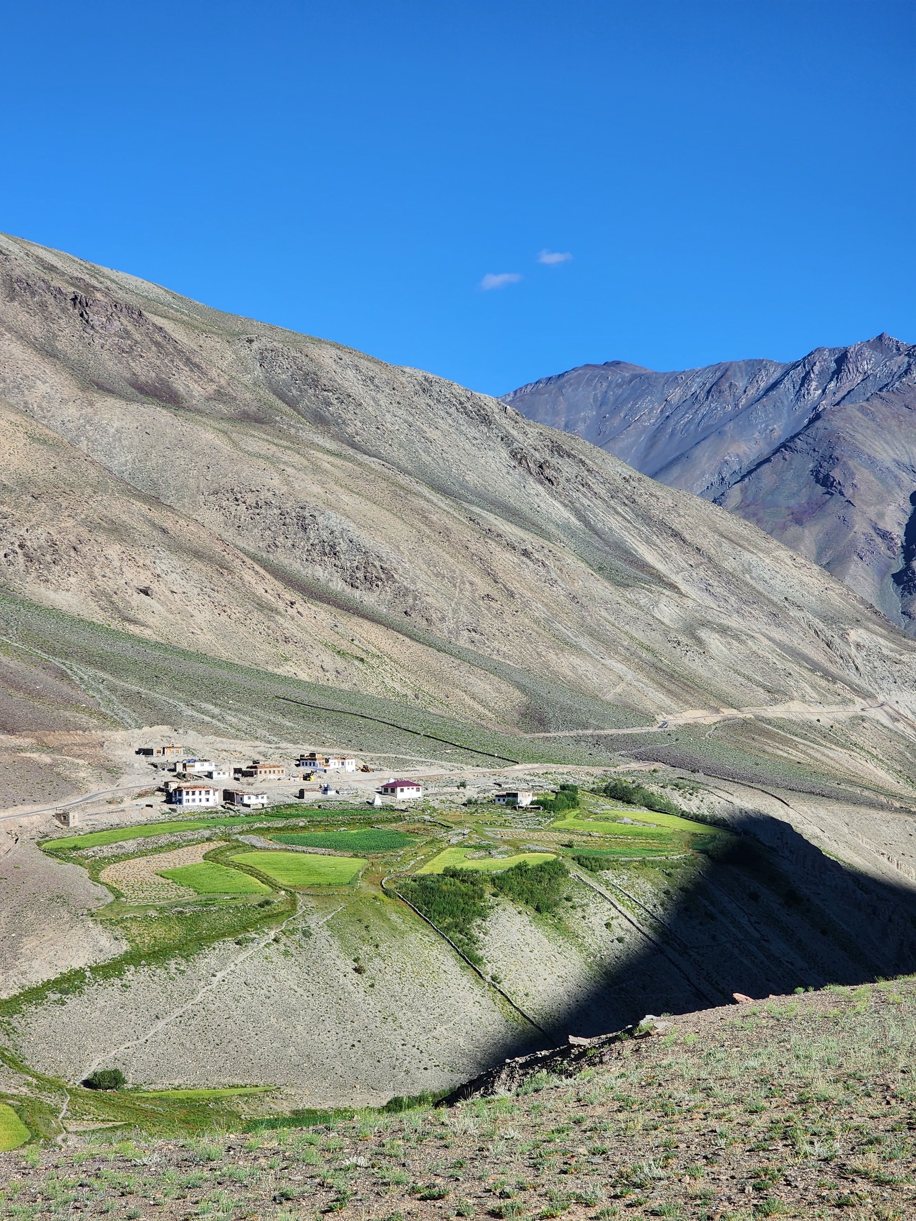 Mountain Village in Remote Valley Landscape · Free Stock Photo