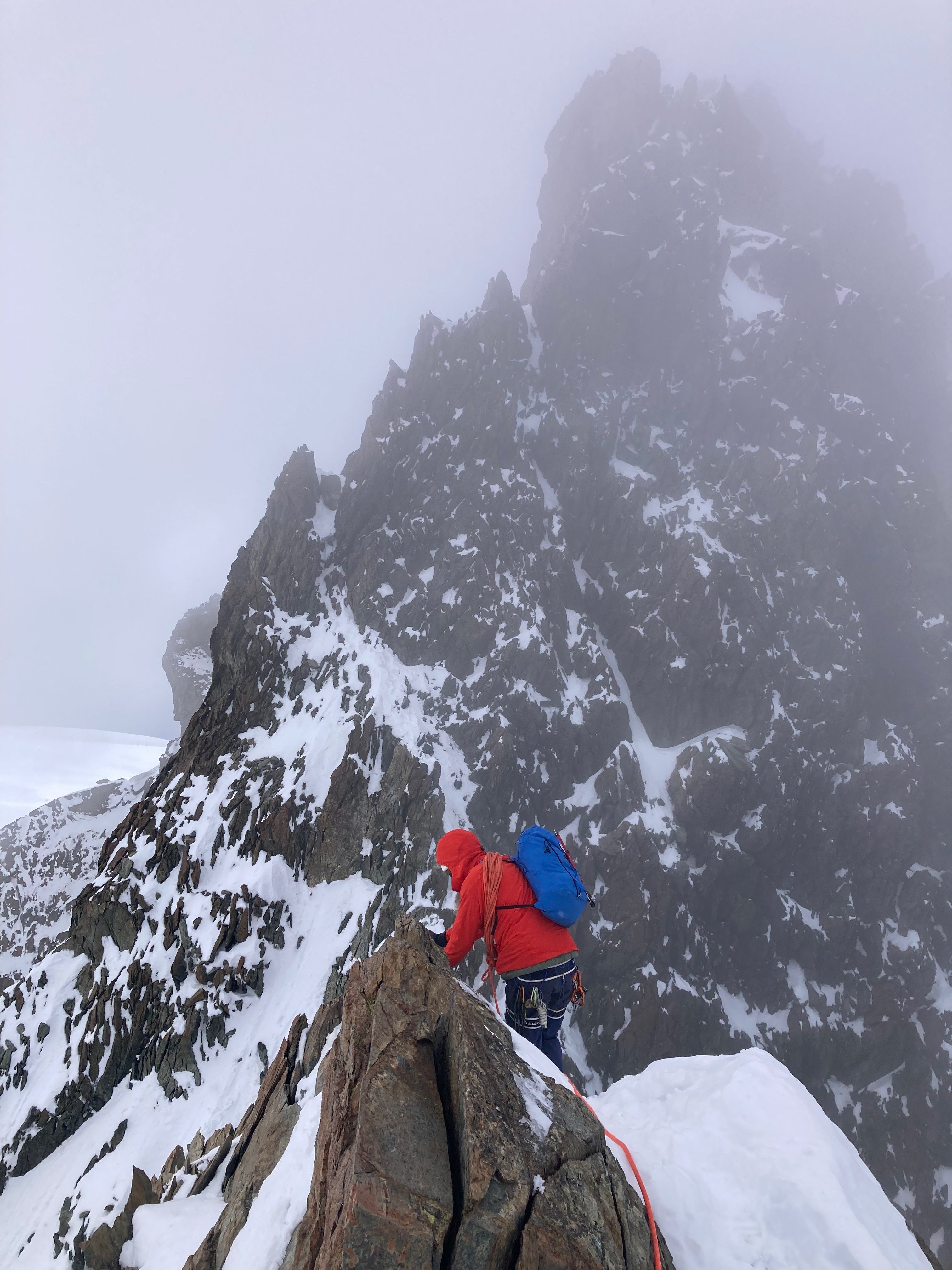 Climber Ascending Snowy Alpine Ridge in Zermatt · Free Stock Photo