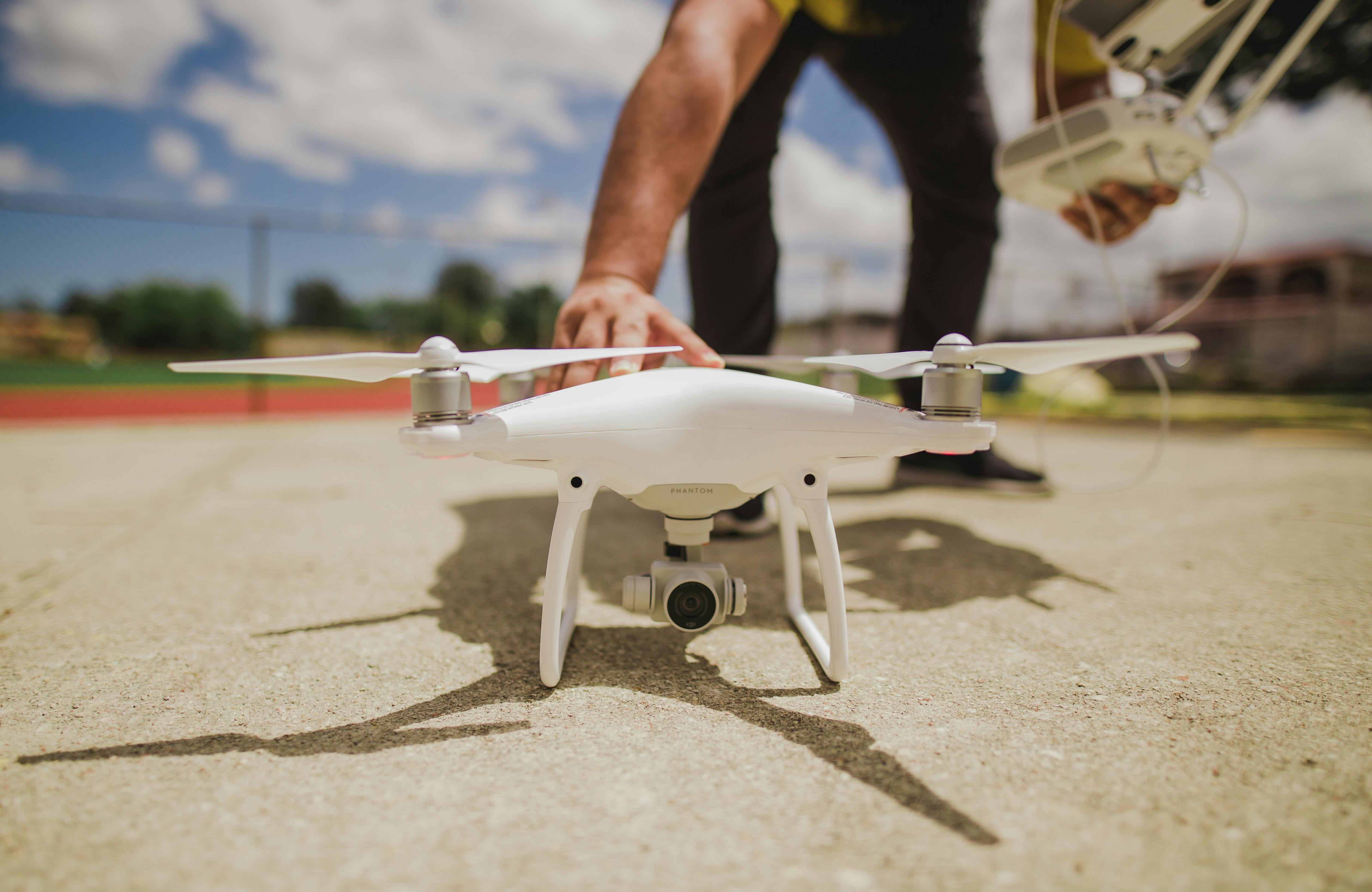 man preparing drone