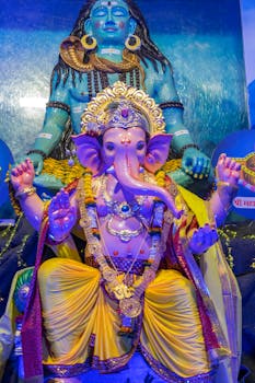 Colorful statue of Lord Ganesha and Shiva during Ganesh Chaturthi in Mumbai.